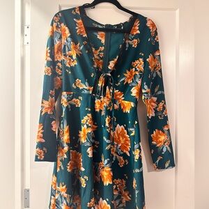 Small size fall dress with printed floral pattern.